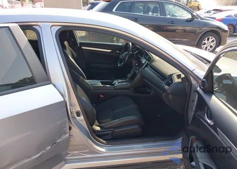 2019 Honda Civic Sport z USA, uszkodzony, nr VIN 2HGFC2F82KH599235